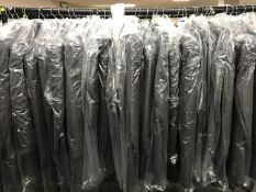 A rail of evening suit jackets - grey