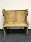 A reclaimed pine small pew