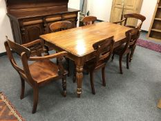 A Barker & Stonehouse Victorian style mahogany dining table and six chairs (two carvers and four
