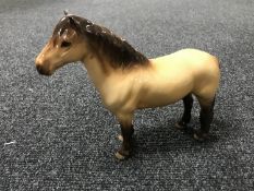 A Beswick horse - Highland pony, model 1644, dunn,