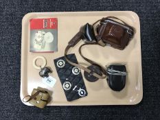 A Braun Paxette camera in case, miniature Minette camera, Weston Master V light gauge,