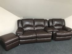 A brown leather electric reclining two seater settee,