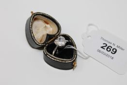 A silver and CZ dress ring