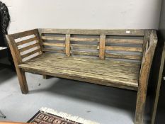 A teak garden bench