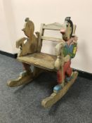 A painted child's rocking chair