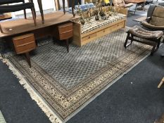 A Turkish woollen carpet on blue ground