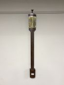 A mahogany and brass stick barometer
