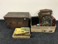 A pine box together with a box containing Edwardian desk calendar, clock parts, lacquered box,