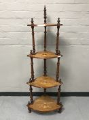 A Victorian inlaid rosewood four tier corner what not stand