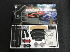 A boxed Scalextric Formula 1 set