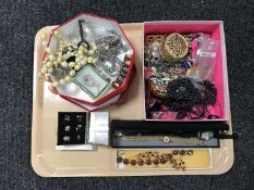 A tray of costume jewellery, beaded purse, lady's watches etc.