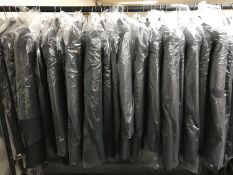 A rail of evening suit jackets - grey