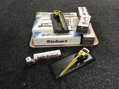 A tray of fourteen part boxed Eddie Stobart vehicles by Atlas