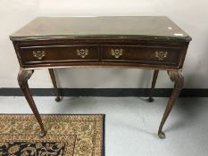 A mahogany glass topped hall table fitted with a drawer on cabriole legs
