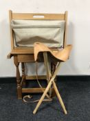 An oak lamp table fitted with a drawer together with a beech and Hessian magazine rack and folding