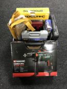 A box of hammer drill, glue gun, hot glue sticks,