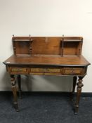 A late nineteenth century inlaid mahogany and walnut lady's dressing table