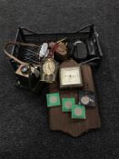 A basket of assorted cameras, oak barometer, brass flat iron,