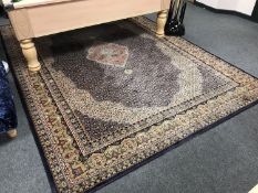 A Turkish machine made carpet on blue ground