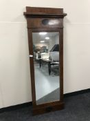 An early 20th century mahogany hall mirror