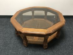 An octagonal two tier coffee table