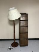 A standard lamp and shade together with a twentieth century desk top filing rack