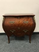 A continental ormolu mounted two drawer bombe chest,