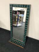 A Danish tiled rosewood mirror with shelf