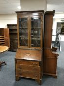 A Victorian inlaid mahogany bureau bookcase