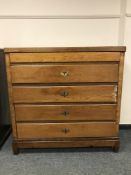A nineteenth century oak five drawer chest,