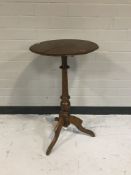 A Victorian mahogany tripod wine table