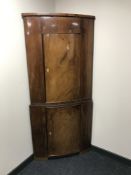 A late nineteenth century mahogany double corner cabinet