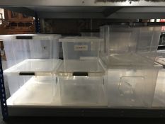 A quantity of plastic storage crates