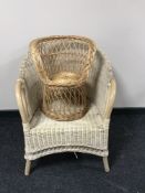 A wicker conservatory armchair and child's chair