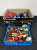A box and basket containing die cast cars and vehicles, together with a tin plated aeroplane,