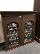 A Victorian and later double door display cabinet with advertising glazed doors,