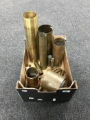 A box of brass ammunition shell and bullet casings