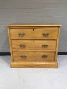 A late Victorian satin walnut three drawer chest