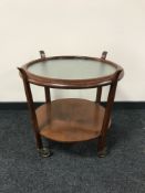 A mid 20th century two tier trolley