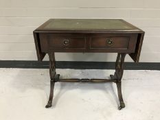 A mahogany leather topped drop end sofa coffee table fitted with two drawers