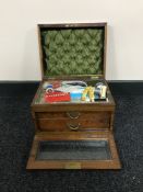 A Victorian rosewood sewing box fitted with two drawers
