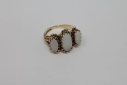 A 9ct gold opal ring,