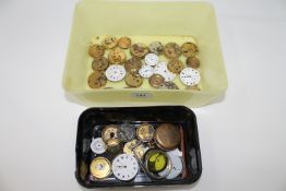 A quantity of pocket watch movements and parts