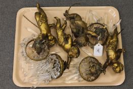 A set of four gilt cherub light fittings