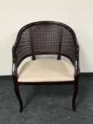 A bergere backed tub chair