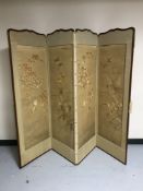 An antique four fold tapestry screen