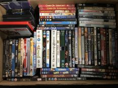 A box of assorted DVD's