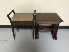 A nest of three mahogany tables together with a mahogany storage piano stool