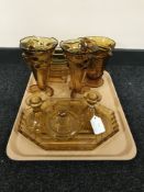 A tray of five piece amber glass trinket set together with an amber glass water jug,
