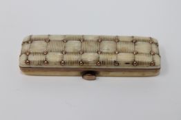 An antique miniature ivory vanity case with gold mounts